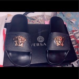 Woman’s Versace slides